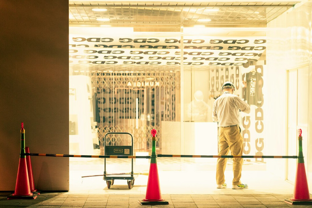 store detective observing customer